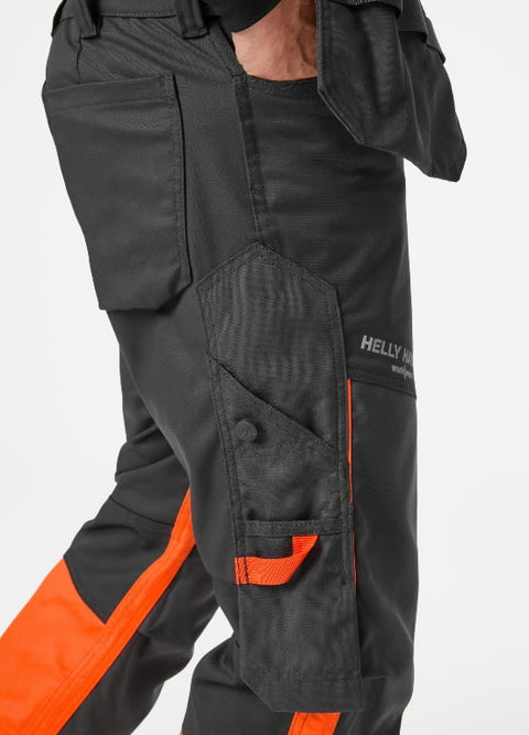 Helly Hansen Hi-Vis darba bikses tuvplāns ar Cordura detaļām
